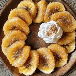 Für gebratene Zimtbananen brauchst du nur einige einfache Zutaten: - 2 reife Bananen - 60 g Allzweckmehl (ca. 1/4 Tasse) - 50 g Zucker (ca. 1/4 Tasse) - 1 Teelöffel gemahlener Zimt - 1/2 Teelöffel Backpulver - 60 ml Milch oder pflanzliche Alternative (ca. 1/4 Tasse) - 1/2 Teelöffel Vanilleextrakt - 60 ml Pflanzenöl (zum Frittieren, ca. 1/4 Tasse) Diese Zutaten sind leicht zu finden. Achte darauf, dass die Bananen reif sind. Sie sollten schön gelb mit einigen braunen Punkten sein. Das sorgt für einen süßen Geschmack. Du kannst die gebratenen Bananen noch besser machen mit diesen Optionen: - Schlagsahne - Vanilleeis Diese Extras bringen eine tolle Cremigkeit zu deinem Dessert. Die Kombination von warmen Bananen und kaltem Eis ist einfach himmlisch! Wähle die besten Bananen für dein Rezept. Hier sind einige Tipps: - Suche nach Bananen, die fest und ohne Druckstellen sind. - Eine leicht gebogene Form ist ideal. - Achte auf die Farbe: Gelb mit kleinen braunen Flecken zeigt Reife. Reife Bananen sind süßer und machen dein Gericht noch leckerer. Wenn du die Bananen im Voraus kaufst, lass sie bei Zimmertemperatur reifen. So sind sie perfekt, wenn du bereit bist zu kochen. Zuerst nehme ich zwei reife Bananen. Ich schäle sie und schneide sie in dicke Stücke. Die Stücke sollten etwa 1,5 cm dick sein. Wenn ich die Bananen geschnitten habe, stelle ich sie beiseite. So sind sie bereit für den Teig. Jetzt mache ich den Teig. In einer Rührschüssel vermische ich 60 g Allzweckmehl, 50 g Zucker, einen Teelöffel gemahlenen Zimt und einen halben Teelöffel Backpulver. Ich rühre gut, bis keine Klumpen mehr da sind. Dann füge ich 60 ml Milch und einen halben Teelöffel Vanilleextrakt hinzu. Mit einem Schneebesen verrühre ich alles, bis der Teig schön glatt ist. Er sollte dick sein, damit er die Bananen gut umhüllt. Jetzt wird es spannend! Ich erhitze 60 ml Pflanzenöl in einer Pfanne bei mittlerer Hitze. Es sollte schön heiß sein. Wenn ich einen kleinen Tropfen Teig ins Öl gebe, höre ich ein zischendes Geräusch. Das zeigt mir, dass das Öl bereit ist. Nun tauche ich jede Bananenscheibe in den Teig. Ich lasse den überschüssigen Teig abtropfen und lege die Bananen vorsichtig ins heiße Öl. Ich frittiere sie in kleinen Portionen, damit die Pfanne nicht zu voll wird. Die Bananenbraten etwa 2 bis 3 Minuten auf jeder Seite, bis sie goldbraun und knusprig sind. Wenn sie fertig sind, nehme ich sie mit einem Schaumlöffel heraus. Ich lege sie auf Küchentücher, damit das Öl abtropfen kann. Ich serviere die gebratenen Zimtbananen sofort. Sie sind warm am besten. Man kann sie auch mit Schlagsahne oder Vanilleeis servieren. Das macht das Dessert noch leckerer! Für die vollständige Anleitung und Zutatenliste, siehe den Full Recipe. Ein häufiger Fehler ist, die Bananen zu dick zu schneiden. Achte darauf, sie in etwa 1,5 cm dicke Stücke zu schneiden. So garen sie gleichmäßig und werden knusprig. Ein weiterer Fehler ist, das Öl nicht heiß genug zu erhitzen. Teste die Temperatur, indem du einen Tropfen Teig hineingibst. Wenn er zischend aufsteigt, ist das Öl bereit. Um die Bananen perfekt knusprig zu machen, tauche sie gut in den Teig. Achte darauf, den überschüssigen Teig abtropfen zu lassen. Frittiere die Bananen in kleinen Portionen. Überfülle die Pfanne nicht, damit sie gleichmäßig garen. Wende die Bananen während des Frittierens, um beide Seiten goldbraun zu bekommen. Die Vorbereitungszeit für gebratene Zimtbananen beträgt nur etwa 10 Minuten. Halte alle Zutaten bereit, um schnell arbeiten zu können. Plane die Kochzeit von 20 Minuten ein, um die Bananen perfekt zu frittieren. So hast du ein schnelles und schmackhaftes Dessert, das jeder genießen kann. Du kannst das Rezept für gebratene Zimtbananen hier nachlesen: [Full Recipe]. {{image_4}} Wenn du nach einer gesünderen Option suchst, kannst du den Teig leicht ändern. Verwende Vollkornmehl statt Allzweckmehl. Das gibt den Bananen mehr Nährstoffe. Du kannst auch Honig oder Agavendicksaft anstelle von Zucker nutzen. Diese Süßungsmittel haben oft mehr Geschmack und weniger Kalorien. Eine andere Idee ist, Mandelmilch oder Hafermilch zu verwenden. Diese pflanzlichen Alternativen machen den Teig leicht und lecker. Um deine gebratenen Zimtbananen aufregender zu machen, versuche exotische Zutaten. Füge etwas Kokosraspel in den Teig hinzu. Dies gibt den Bananen einen tropischen Geschmack. Du kannst auch eine Prise Muskatnuss oder Ingwer verwenden. Diese Gewürze passen gut zu Zimt. Für einen besonderen Twist, tauche die gebratenen Bananen in Schokolade. Lass die Schokolade fest werden, bevor du sie servierst. Das gibt einen tollen Crunch! Die Art, wie du deine gebratenen Bananen präsentierst, macht einen großen Unterschied. Serviere sie auf einem schönen Teller. Ein Hauch von Zimtpulver oben drauf sieht toll aus. Frische Minze gibt einen schönen Farbkontrast. Du kannst die Bananen auch mit einer Kugel Vanilleeis kombinieren. Das kalte Eis passt perfekt zu den warmen Bananen. Auch eine Prise Nüsse dazu gibt eine knusprige Note. Probiere verschiedene Kombinationen aus, um deinen Favoriten zu finden! Wenn Sie nach einem besonderen Anlass übrig gebliebene Zimtbananen haben, bewahren Sie sie einfach in einem luftdichten Behälter auf. So bleiben sie frisch. Stellen Sie sicher, dass sie vollständig abgekühlt sind, bevor Sie sie lagern. So verhindern Sie, dass sie matschig werden. Lagern Sie die Bananen im Kühlschrank. So bleiben sie bis zu drei Tage genießbar. Sie können gebratene Zimtbananen auch einfrieren. Legen Sie sie zuerst auf ein Backblech, um sie einzufrieren. So kleben sie nicht zusammen. Nach ein paar Stunden können Sie die Bananen in einen Gefrierbeutel geben. Achten Sie darauf, die Luft herauszudrücken. Im Gefrierschrank halten sie bis zu zwei Monate. Wenn Sie sie später genießen möchten, lassen Sie sie einfach im Kühlschrank auftauen. Um die gebratenen Bananen aufzuwärmen, nutzen Sie eine Pfanne bei niedriger Hitze. So werden sie knusprig und warm. Wenden Sie sie vorsichtig, damit sie nicht zerfallen. Alternativ können Sie die Bananen auch im Ofen bei 180 Grad Celsius aufwärmen. Legen Sie sie auf ein Backblech und erwärmen Sie sie etwa 10 Minuten. So bleiben die Aromen erhalten und sie schmecken fast wie frisch zubereitet. Gebratene Zimtbananen sind am besten frisch. Sie schmecken warm und knusprig. Wenn du sie im Kühlschrank aufbewahrst, bleiben sie etwa zwei Tage gut. Achte darauf, sie in einem luftdichten Behälter zu lagern. So bleiben sie etwas weicher, aber der knusprige Teil geht verloren. Ja, du kannst die Bananen auch ohne Teig frittieren. Schneide die Bananen einfach in Stücke. Dann brate sie in heißem Öl für 1-2 Minuten an. Sie werden weich und süß. Es fehlt jedoch die knusprige Textur des Teigs. Wenn du eine schnellere Option suchst, ist das eine gute Wahl. Gebratene Zimtbananen passen gut zu vielen Beilagen. Hier sind einige Ideen: - Schlagsahne für einen süßen Kontrast - Vanilleeis, das schmilzt und die Bananen ergänzt - Joghurt für eine cremige Note - Gehackte Nüsse für zusätzlichen Crunch - Frische Minze für einen frischen Geschmack Du kannst auch die gebratenen Zimtbananen als Topping für Pfannkuchen oder Waffeln verwenden. Sie fügen einen tollen Geschmack hinzu. Probiere es einfach aus! Du findest die genaue Zubereitung im Full Recipe. In diesem Artikel habe ich die besten Zutaten und Schritte für gebratene Zimtbananen erklärt. Du hast gelernt, welche Zutaten wichtig sind und wie man sie zubereitet. Ich habe hilfreiche Tipps gegeben, um die perfekte Knusprigkeit zu erreichen und häufige Fehler zu vermeiden. Variationen und Lagerungshinweise helfen dir, das Rezept anzupassen. Schließlich kannst du mit den Antworten auf häufige Fragen sicherstellen, dass deine Zimtbananen immer köstlich sind. Lass deine Kreationen die Sinne erfreuen!