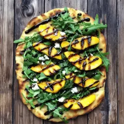 Um diese leckere gegrillte Pfirsich- und Rucola-Fladenbrot zu machen, brauchst du: - 2 Fladenbrote (fertig gekauft oder selbstgemacht) - 2 reife Pfirsiche, in Scheiben geschnitten - 2 Esslöffel Olivenöl - 1 Tasse frischer Rucola - ½ Tasse Ziegenkäse, zerbröckelt - ¼ Tasse Balsamico-Glasur - Salz und Pfeffer nach Geschmack - Frische Basilikumblätter zur Dekoration (optional) Diese Zutaten machen das Gericht frisch und lecker. Die Pfirsiche bringen Süße, während der Rucola einen würzigen Biss gibt. Ziegenkäse sorgt für eine cremige Textur. Die Vorbereitungszeit für dieses Rezept beträgt nur 10 Minuten. Du kannst das Gericht in etwa 20 Minuten zubereiten. Es ergibt 4 Portionen, perfekt für ein kleines Treffen oder eine schnelle Mahlzeit. Einige gute Ergänzungen für das Rezept sind: - Du kannst frische Kräuter wie Thymian oder Oregano hinzufügen. - Ein Spritzer Zitronensaft gibt dem Gericht eine frische Note. - Wenn du es schärfer magst, füge etwas rote Paprikaflocken hinzu. Diese Ergänzungen helfen, den Geschmack zu verstärken und das Gericht noch interessanter zu machen. Nutze deine Kreativität und passe es nach deinem Geschmack an. Du findest die vollständige Anleitung in der [Full Recipe]. Zuerst musst du deinen Grill aufheizen. Stelle ihn auf mittlere bis hohe Hitze ein. Das sorgt für die besten Grillmarkierungen. Während der Grill aufheizt, schnapp dir die Zutaten. Du brauchst: - 2 Fladenbrote (fertig gekauft oder selbstgemacht) - 2 reife Pfirsiche, in Scheiben geschnitten - 2 Esslöffel Olivenöl - 1 Tasse frischer Rucola - ½ Tasse Ziegenkäse, zerbröckelt - ¼ Tasse Balsamico-Glasur - Salz und Pfeffer nach Geschmack - Frische Basilikumblätter zur Dekoration (optional) Jetzt vermische die Pfirsichscheiben in einer Schüssel mit 1 Esslöffel Olivenöl. Füge eine Prise Salz und Pfeffer hinzu. So schmecken die Pfirsiche besser. Lege die Pfirsichscheiben auf den Grill. Lasse sie etwa 2-3 Minuten pro Seite grillen. Sie sollten leicht angekohlt und zart sein. Nimm sie dann vom Grill. Bestreiche die Fladenbrote mit dem restlichen Olivenöl. Lege sie auch auf den Grill. Erhitze sie für 2-3 Minuten. So bekommen sie schöne Grillspuren. Jetzt ist es Zeit, die Fladenbrote zusammenzustellen. Verteile die gegrillten Pfirsiche gleichmäßig auf den Fladenbroten. Streue den frischen Rucola und den zerbröckelten Ziegenkäse darüber. Träufle die Balsamico-Glasur passend über die Fladenbrote. Garniere sie nach Wunsch mit frischen Basilikumblättern. Schneide die Fladenbrote in Stücke und serviere sie sofort. Das ist der köstliche Genuss von gegrilltem Pfirsich- und Rucola-Fladenbrot. Du wirst überrascht sein, wie einfach und lecker es ist! Schau dir das vollständige Rezept für mehr Details an. Ein typischer Fehler ist, die Pfirsiche zu lange zu grillen. Achten Sie darauf, sie nur 2-3 Minuten pro Seite zu grillen. Andernfalls werden sie zu weich und verlieren ihren Geschmack. Ein weiterer Fehler ist, zu viel Salz zu verwenden. Ein wenig reicht aus, um die Aromen hervorzuheben. Starten Sie mit der Auswahl reifer Pfirsiche. Diese sind süßer und saftiger. Schneiden Sie die Pfirsiche in gleichmäßige Scheiben. Das sorgt für gleichmäßiges Grillen. Heizen Sie den Grill gut vor. Ein heißer Grill gibt den Pfirsichen schöne Grillstreifen. Verwenden Sie Olivenöl, um die Fladenbrote zu bepinseln. Das hilft, dass sie nicht kleben. Servieren Sie das Fladenbrot mit einem frischen Salat. Ein einfacher grüner Salat passt gut dazu. Auch gegrilltes Gemüse ist eine tolle Beilage. Für den perfekten Genuss können Sie die Fladenbrote mit etwas frischem Basilikum dekorieren. Die Kombination von Pfirsichen und Rucola bringt ein tolles Geschmackserlebnis. Für das komplette Rezept schauen Sie sich den [Full Recipe] an. {{image_4}} Für eine vegetarische Option kannst du den Ziegenkäse durch Feta ersetzen. Er hat einen starken Geschmack und passt gut zu Pfirsichen. Wenn du eine vegane Variante möchtest, nutze einen pflanzlichen Käse. Du kannst auch eine Avocado-Creme als Ersatz verwenden. Diese gibt einen cremigen Geschmack, der die Süße der Pfirsiche ergänzt. Pfirsiche sind super, aber du kannst auch andere Früchte ausprobieren. Nektarinen oder Ananas sind tolle Alternativen. Sie geben dem Fladenbrot einen neuen Twist. Achte darauf, die Früchte gleichmäßig zu grillen. Das bringt den süßen Geschmack hervor. Du kannst verschiedene Käsesorten verwenden, um neue Geschmäcker zu entdecken. Probiere Mozzarella für eine mildere Note. Parmesan bringt eine salzige Tiefe in das Gericht. Oder nutze Blauschimmelkäse für einen kräftigen Kick. Jede Käseart gibt dem Fladenbrot ein anderes Aroma und macht es spannend. Für das volle Rezept besuche bitte die [Full Recipe]. Um dein gegrilltes Pfirsich- und Rucola-Fladenbrot frisch zu halten, lege es in einen luftdichten Behälter. Achte darauf, dass der Behälter sauber und trocken ist. So bleibt der Geschmack gut erhalten. Kühl lagern ist wichtig. Der Kühlschrank ist ideal. Wenn du es länger aufbewahren willst, friere die Fladenbrote ein. Wickel sie gut in Frischhaltefolie ein. So bleibt die Frische für bis zu drei Monate. Wenn du Reste aufwärmen möchtest, benutze den Grill oder den Ofen. So bleibt das Fladenbrot knusprig. Stelle sicher, dass die Temperatur mindestens 75 Grad Celsius erreicht. Das tötet mögliche Bakterien ab. Vermeide die Mikrowelle, da sie das Brot weich macht. Achte darauf, die Reste innerhalb von drei Tagen zu essen. Das hilft, Lebensmittelvergiftungen zu vermeiden. Du kannst Reste kreativ nutzen. Schneide das Fladenbrot in Stücke und mache einen Salat. Mische es mit frischem Gemüse und einem Dressing. Auch als Snack sind die Reste toll. Erhitze sie einfach und genieße sie mit Hummus oder einer anderen Dipp-Sauce. Wenn du noch Pfirsiche hast, grille sie erneut. Sie passen gut zu vielen Speisen. Die Fladenbrote halten sich gut für bis zu drei Tage. Lagern Sie sie in einem luftdichten Behälter. So bleiben sie frisch und weich. Wenn Sie sie länger aufbewahren möchten, können Sie sie auch einfrieren. Wickeln Sie die Fladenbrote gut ein. Zum Aufwärmen einfach im Ofen oder Toaster kurz erwärmen. Ja, Sie können die Pfirsiche auch in der Pfanne grillen. Eine Grillpfanne ist perfekt dafür. Erhitzen Sie die Pfanne einfach auf mittlerer Hitze. Fügen Sie einen Esslöffel Olivenöl hinzu und grillen Sie die Pfirsiche für zwei bis drei Minuten pro Seite. So bekommen die Pfirsiche schöne Grillspuren und bleiben süß. Zu diesem Fladenbrot passen viele Dinge gut. Probieren Sie frische Tomaten oder Avocado. Auch Schinken oder Prosciutto sind lecker. Ein leichter Salat mit Zitronen-Dressing ergänzt das Gericht gut. Balsamico-Glasur bringt einen tollen süßen Geschmack. Für einen zusätzlichen Kick können Sie auch Chili-Flocken verwenden. Um gegrilltes Pfirsich- und Rucola-Fladenbrot zuzubereiten, haben wir alle Zutaten und Schritte behandelt. Wir haben Tipps gegeben, wie du häufige Fehler vermeiden kannst. Varianten und Lagerung helfen dir, das Beste aus dem Rezept herauszuholen. Denke daran: Kreativität ist der Schlüssel zum Kochen. Hab Spaß dabei und probiere neue Kombinationen aus! So wird dein Gericht zu etwas Einzigartigem und Leckerem.